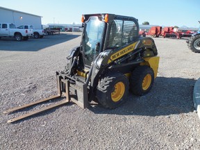 RCMP are seeking information on the theft of a New Holland L220, similar to the one pictured here, which was stolen form the Pincher Creek Farm Centre last weekend.