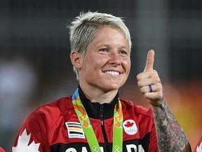 Canada's captain Jen Kish gives a thumbs up during the medal ceremony after winning the bronze medal game against Great Britain in women's rugby sevens at the 2016 Olympic Games in Rio de Janeiro, Brazil on Monday, Aug. 8, 2016. THE CANADIAN PRESS/Sean Kilpatrick
