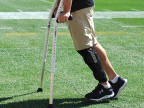 Injured Pittsburgh Steelers kicker Shaun Suisham of Wallaceburg uses crutches as he moves along the sideline before a pre-season game against the Green Bay Packers on Aug. 23, 2015, in Pittsburgh. (VINCENT PUGLIESE/The Associated Press)