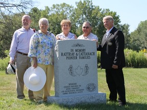 Jim Keely, Chris Keely, Catherine Bouman, Coun. Darrell Randall and St. Clair Township mayor Steve Arnold stand by the new memorial stone in Branton-Cundick Park honouring two Scottish pioneer families, the Cattanach-Rattrays. 
CARL HNATYSHYN/SARNIA THIS WEEK