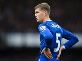 John Stones, who has signed a six-year deal, now ranks alongside David Luiz as the most expensive defender in football history - despite not being a regular at former club Everton last season. (AP Photo/Jon Super, file)
