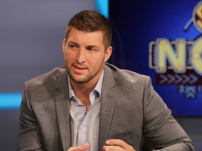 Tim Tebow, with his pro football career not working out, will give baseball a try. (Chuck Burton/AP Photo/Files)