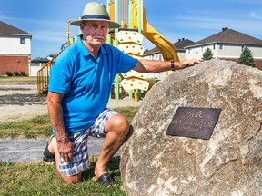 Gilles Lamadeleine shows the rock that honours his father, Omer, in Omer Lamadeleine Park in Embrun. Omer was among the nine workers who died as a result of the Heron Road Bridge collapse on Aug. 10, 1966. (Bruce Deachman, Postmedia News)