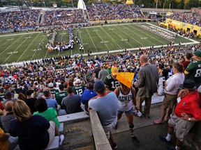 Fans leave Tom Benson Hall of Fame Stadium after it was announced that the preseason NFL football game between the Green Bay Packers and the Indianapolis Colts was cancelled due to unsafe field conditions, Sunday, Aug. 7, 2016, in Canton, Ohio. (AP Photo/Gene J. Puskar)