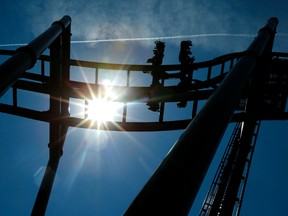 People ride "The Joker," the latest roller coaster at Six Flags Great Adventure, during the ride's unveiling, Thursday, May 26, 2016, in Jackson, N.J. in this file photo. (AP Photo/Julio Cortez)