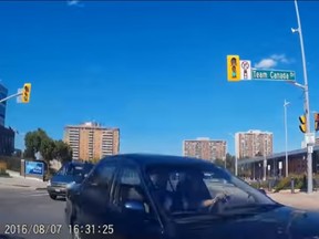 A still photo from a dashcam video shot during a collision at a Brampton intersection on Aug. 7, 2016. (YouTube)