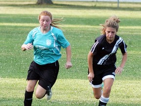 Wallaceburg Sting girls under 14 player Issy DeBot chases the ball during a game at Steinhoff Park on  July 27 against Lambeth FC. Lambeth won the Elgin Middlesex District Soccer League game by a 3-1 score. Samantha St. Croix had Wallaceburg's goal