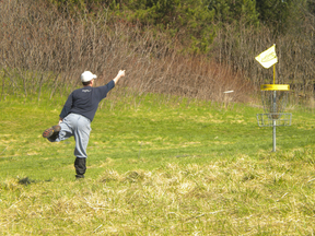 A man playing frisbee golf. (File photo by Justine Alkema)