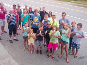 The Koops Clan headed by Ralph and Anne Koops crowded in at the Holyrood General Store on July 30, 2016. The family packed the store while they filed through to get ice cream from the popular destination in Huron-Kinloss (Troy Patterson/Editor)