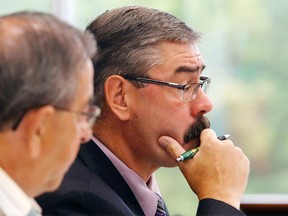 Luke Hendry/The Intelligencer
Hastings County social services director Steve Gatward, right, and chairman Garnet Thompson participate in a committee meeting in Belleville Wednesday. Housing projects dominated the agenda, with many more units planned for construction and others for sale.