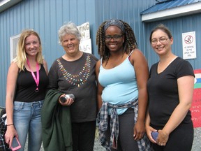 Sarnia social justice advocate Thea deGroot, second from left, is pictured here during her recent visit to Kitchenuhmaykoosib Inninuwug First Nation. She and 26 other southern Ontario residents -- including Toronto Mayor John Tory -- participated in the annual reconciliation trip organized by youth in the northern Ontario community. (Submitted photo/The Observer/Postmedia Network)