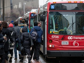 Ottawa's transit commission is considering a proposal to offer a discount rate for low income riders. (Errol McGihon, Postmedia News)