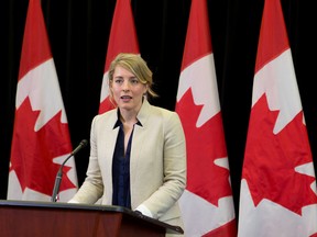 The Honourable Melanie Joly, Minister of Canadian Heritage, answers questions from the media after hosting a roundtable with key stakeholders to share the results of a survey on the planned Memorial to the Victims of Communism in Ottawa on Friday April 22, 2016. (Errol McGihon, Postmedia News)