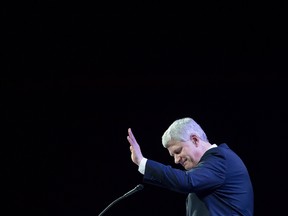 Former prime minister Stephen Harper waves as he steps away from the podium after addressing delegates during the 2016 Conservative Party Convention in Vancouver, B.C. on Thursday May 26, 2016. THE (Darryl Dyck, The Canadian Press)