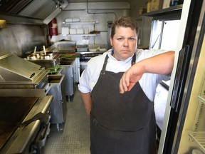 Chris Allan poses for a photo in a food truck in Ottawa Wednesday Aug 10, 2016. Chris was working for the government but didn't receive pay due to the glitchy pay system.  (Tony Caldwell, Postmedia News)