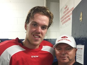 Connor McDavid poses with Greg Leavers, security expert, in this undated handout photo.