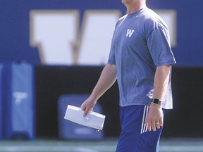 Coach Mike O’Shea watches his Blue Bombers practise yesterday in Winnipeg. The once-struggling Bombers are on a two-game win streak heading into tomorrow’s tilt in Toronto against the Argos. (Chris Procaylo, Postmedia Network)