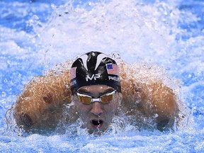 USA's Michael Phelps competes in the Men's 200m Individual Medley Semifinal during the swimming event at the Rio 2016 Olympic Games at the Olympic Aquatics Stadium in Rio de Janeiro on August 10, 2016.   / AFP PHOTO / GABRIEL BOUYSGABRIEL BOUYS/AFP/Getty Images