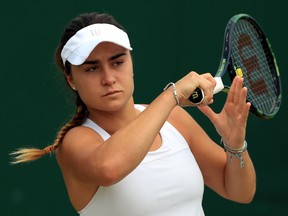 This is a July 2016 file photo of of  rising British tennis star Gabriella Taylor in action at Wimbledon London. British police are investigating allegations that Taylor a player at the Wimbledon tennis tournament was poisoned, after she fell ill with a bacterial infection that can be spread through rat urine. Gabriella Taylor was playing in the junior tournament when she became sick . (John Walton/PA, File via AP)