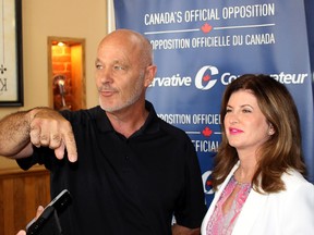 Chatham-Kent Leamington MP Dave Van Kesteren pointed out some local points of history to interim Conservative Party leader Rona Ambrose during a scrum with media at the Retro Suites Hotel as part of her stop in Chatham, Ont. on Thursday August 11, 2016. (Ellwood Shreve/Chatham Daily News)