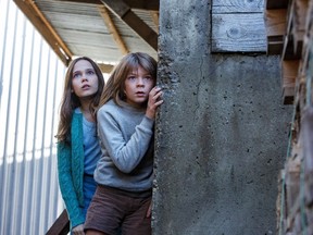 Oakes Fegley is Pete and Oona Laurence is Natalie in Disney's PETE'S DRAGON, the story of a boy named Pete and his best friend Elliot, who just happens to be a dragon. (Handout photo)