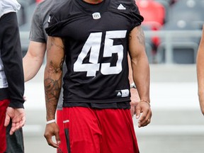 Damaso Munoz finds something to smile about during a recent Ottawa Redblacks practice. (Wayne Cuddington/ Postmedia)