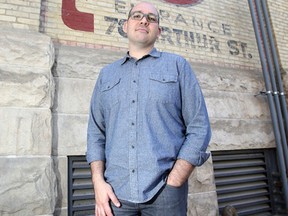 Matt Cohen will lead a tour of the fading signs that adorn buildings in the Exchange District.  Some signs are 100 years old.   Tuesday, August 09, 2016.   Sun/Postmedia Network