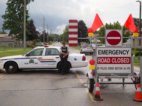 RCMP have closed Park Street in Strathroy after suspected terrorist Aaron Driver was killed Wednesday in the small town west of London, Ont. on Thursday August 11, 2016. (Mike Hensen/The London Free Press/Postmedia Network)
