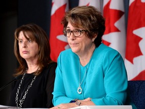 Deputy Minister of Public Works and Government Services Marie Lemay (right) and and associate assistant deputy minister Rosanna Di Paola speak to reporters during a technical briefing on the Phoenix pay system on Thursday, Aug. 11, 2016 in Ottawa.