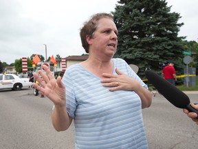 Maria Melo, who lives across the street from the house where the RCMP shot and killed terrorism suspect Aaron Driver, describes what she saw when police descended on the home in Strathroy on Wednesday. (CRAIG GLOVER, The London Free Press)