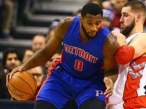 Jonas Valanciunas of the Toronto Raptors defends against Andre Drummond of the Detroit Pistons during an NBA game at the Air Canada Centre on Jan. 12, 2015. (DAVE ABEL/Toronto Sun files)