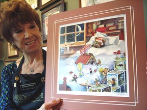 Eleanor Robson holds cover illustration for Peter Robson's Story Time Bear, a children's read-along picture book to be released next month in support of St. Thomas Elgin General Hospital Foundation and STEGH's new special care nursery.