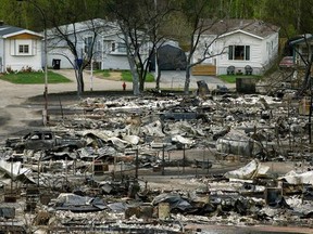 There were 2,400 structures burned in Fort McMurray in the wildfire. Experts report it could cost insurers up to $9 billion to rebuild the entire city, and Albertans could see an increase in their insurance premiums as a result. - Photo by Larry Wong