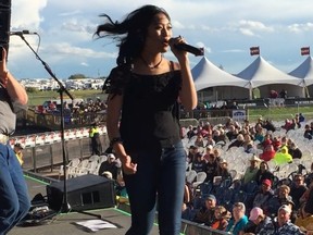 Téa Gonzales opening for Carrie Underwood during the Big Valley Jamboree this year. Gonzales, 14, was the grand prize winner of the ATB Homegrown Talent Stage singing competition.  - Photo submitted