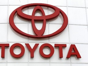 In this March 30, 2011 file photo, the Toyota logo is shown at Wilsonville Toyota, in Wilsonville, Ore. (AP Photo/Rick Bowmer)