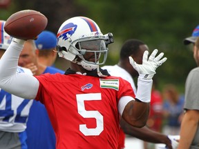 Buffalo Bills quarteback Tyrod Taylor throws a pass during NFL football training camp in Pittsford, N.Y. The Bills have placed their faith in quarterback Tyrod Taylor by signing him to a contract extension. (AP Photo/Jeffrey T. Barnes, File)
