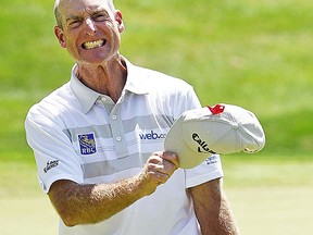 Veteran pro Jim Furyk celebrates his record round at the recent PGA Travelers Championship in Cromwell, CT. (PGA Tour photo)