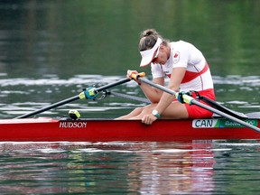 Carling Zeeman, of Canada, rests after competing in the women's rowing single sculls semifinal during the 2016 Summer Olympics in Rio de Janeiro, Brazil, Friday, Aug. 12, 2016. (AP Photo/Luca Bruno)