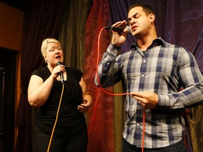 Heidi Joshua and Michael Victorero sing competitive karaoke. (Michael Peake/Toronto Sun)