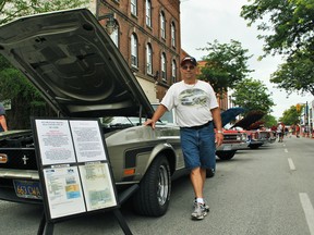 Geoff Clement of Chatham poses with his 1971 Mustang Mach 1 at the 28th Wallaceburg Antique Motor and Boat Outing on Saturday. (Tom Morrison/The Daily News)