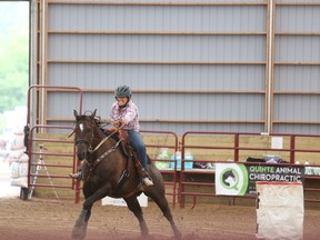 Brianna Rossit competes at a Ontario Barrel Horse Association sanctioned competition held at Cedar Rail Farms, on Casey Road.