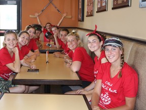 Danielle Pine stops to enjoy lunch with her fellow Children’s International Summer Villages delegates in this file photo. A group of kids is travelling across the country to talk about CISV and will be stopping in Sudbury on July 14. (Supplied photo)