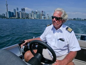 Captain Terry Turl is pictured in his water taxi on Aug. 10, 2016. (VERONICA HENRI, Toronto Sun)