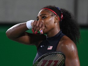 USA's Serena Williams reacts after losing a point during her women's third round singles tennis match agaisnt Ukraine's Elina Svitolina at the Olympic Tennis Centre of the Rio 2016 Olympic Games in Rio de Janeiro on August 9, 2016. (ACOSTA/AFP/Getty Images)