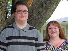 Andrew Sorensen and his mother Kacey Conway. (Steph Crosier/The Whig-Standard)