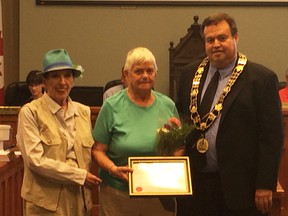 Donna Murray accepted the Senior of the Year award from Goderich Mayor Kevin Morrison at the Aug. 8 council meeting. Murray was nominated by Jennifer Black for the dedication to volunteering at the Emergency Room at AMGH. Pictured here, from left to right, Jennifer Black, Donna Murray and Mayor Kevin Morrison. (Laura Broadley/Goderich Signal Star)