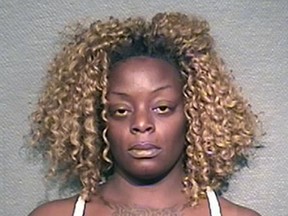 This undated booking photo provided by the Houston Police Department shows Sheborah Latrice Thomas. Thomas, who calmly told an acquaintance that she had drowned her two children in a bathtub, has been charged in their deaths and was being held without bond Monday, Aug. 15, 2016. (Houston Police Department via AP)