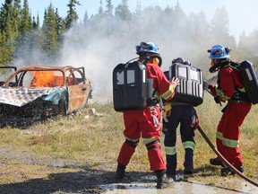 Goldcorp's Mine Rescue Team practiced their skills battling a car fire on Tuesday at Northern College's Pre-Service Firefighting facility. The 10-person team will be training all week, with the aid of Porcupine Gold Mine's Surface Emergency Rescue Team, in preparation for the upcoming International Mine Rescue Competition in Sudbury at the end of August.