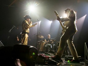 Gord Downie leads a Tragically Hip concert at the Scotiabank Saddledome in Calgary earlier this month. (Lyle Aspinall/Postmedia Network)