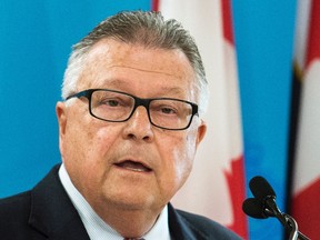 Minister of Public Safety and Emergency Preparedness Ralph Goodale makes a funding announcement during a visit to an immigrant holding centre in Laval, Que., Monday, August 15, 2016. THE CANADIAN PRESS/Graham Hughes